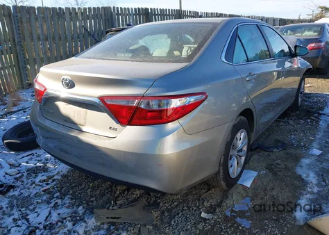 2016 Toyota Camry Le z USA, uszkodzony, nr VIN 4T1BF1FK3GU185648